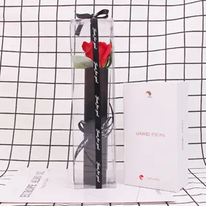 Single red soap rose in a clear PVC gift box with a decorative ribbon.