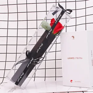 Elegant single red rose soap flower inside a transparent PVC gift box with decorative ribbon