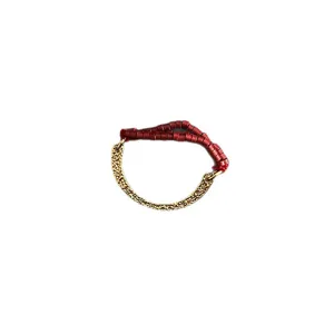 Elegant C-shaped elastic ring with hammered gold texture and deep red seed beads