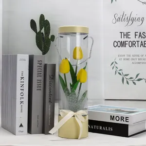 Artificial tulip flower in clear PVC cylinder gift box, ideal home decor and photography prop.