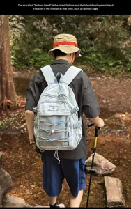 Large capacity outdoor hiking backpack featuring durable light blue nylon fabric.