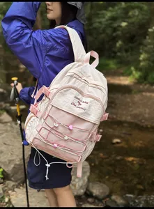 Large capacity minimalist pink backpack for students and outdoor hiking travel use