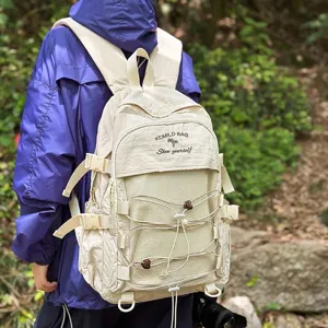 Large capacity minimalist beige unisex backpack for students, suitable for outdoor travel