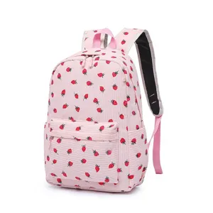Detailed view of a pink corduroy backpack featuring vibrant red strawberry print patterns