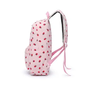 Side view of a pink strawberry print backpack for girls in Japanese school style.