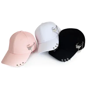 Women's fashion baseball cap with metal rings, chains and butterfly charms for summer sun protection.