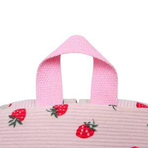 Close-up of pink strawberry pattern corduroy backpack handle