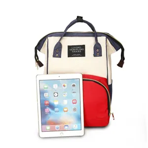 Meerkleurige nylon rugzak luiertas met ritssluiting en iPad voor maatvergelijking