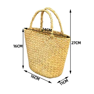 Detailed close-up view of the straw woven tote bag showcasing weave texture and dimensions.