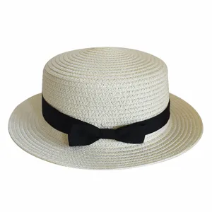 Straw boater hat with black ribbon detail, lightweight and breathable for summer sun protection.