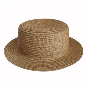 Straw boater hat detail showing tight natural weave texture, flat crown and wide brim design.