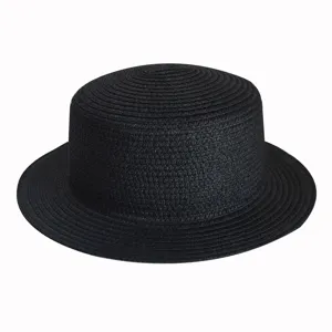 Close-up detail of the black flat-top straw hat, showing breathable woven texture clearly.