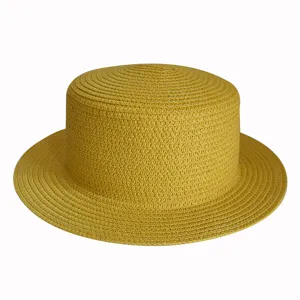 Yellow straw hat detail showcasing fine woven texture and flat top design for summer outdoor wear.
