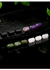 Various natural stone cylinder beads including rose quartz and amethyst for DIY jewelry