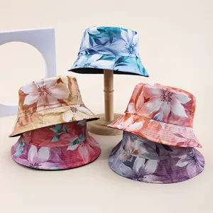 Variety of colorful floral print bucket hats for sun protection and style.