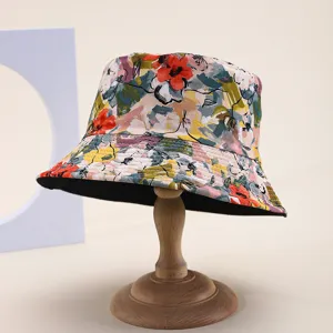 Detailed macro view of oil painting floral print on reversible bucket sun hat for summer