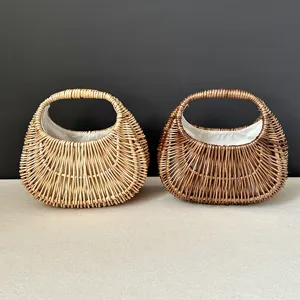 Close-up detail of the crescent wicker woven bag with white inner lining, elegant texture.