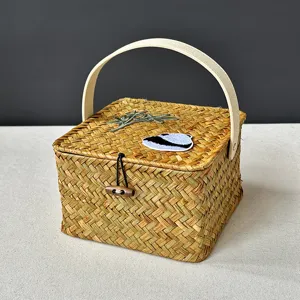 Handcrafted woven storage basket gift box with handle and toggle closure for home decor storage.