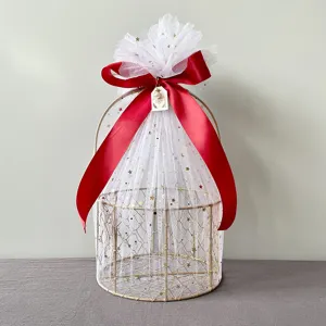 Gold metal gift basket with white star mesh and red ribbon bow for wedding party