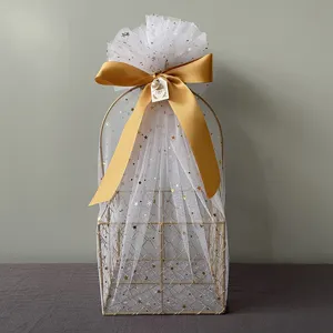 Gold wire gift basket with white star tulle and bow, perfect for weddings, birthdays, and celebrations.