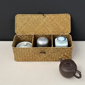 Hand-woven seagrass storage box featuring three compartments for tea sets and accessories