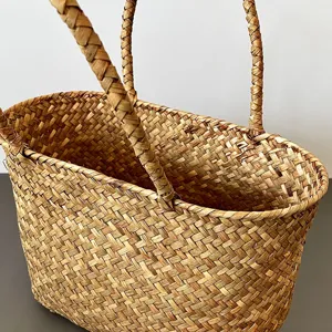 Close-up of handcrafted seagrass woven basket showing intricate natural texture