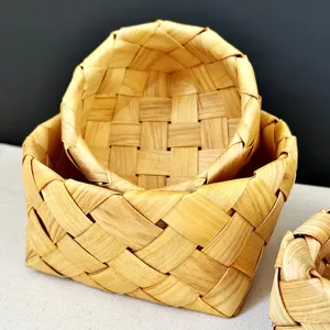 Close-up detail of hand-woven Japanese style natural wood storage basket weave pattern