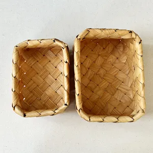 Set of two handcrafted Japanese-style woven wooden storage baskets for home organization