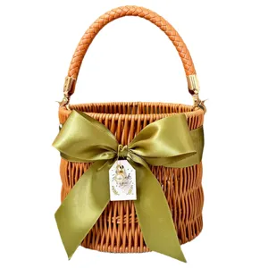 Woven rattan gift basket with green ribbon bow, portable bucket handbag for wedding bridesmaid