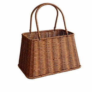 Detailed dimension diagram for brown woven rattan gift basket with handheld design