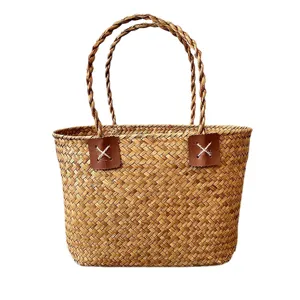 Handmade natural seagrass woven gift basket with durable leather patches and twin handles