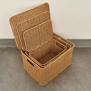 Nested plastic wicker storage baskets with lids and handles, ideal for bedroom organization.