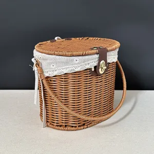 Detailed view of hand-woven imitation rattan basket with floral inner lining and secure latch.