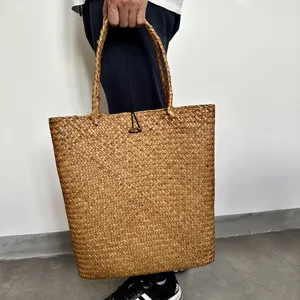 Large handmade straw woven tote bag for women, perfect for summer beach travel and daily casual use.