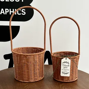 Plastic rattan flower baskets, woven storage baskets with handles for gifts and floral decor.
