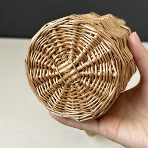 Handcrafted small woven straw basket mini cylinder candy gift basket rustic style.