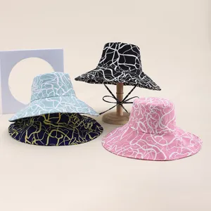 Wide brim bucket hat for women, foldable digital print sun protection beach travel sun hat.