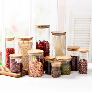 Glass storage jar set with bamboo lids, clear kitchen food organizer for pantry dry goods.