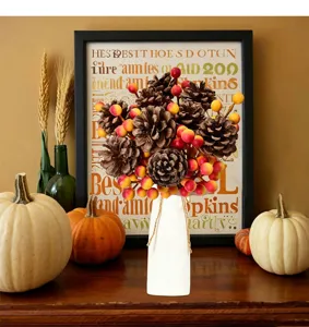 Close-up view of 18 artificial pine cones and red berries for Thanksgiving decor