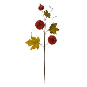 Detailed view of harvest festival decoration with velvet pumpkins and maple leaves