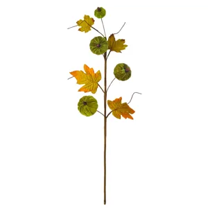 Decorative autumn branch with green velvet pumpkins and realistic maple leaves decor