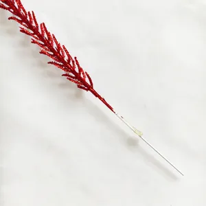 Detailed close-up view of a vibrant red glitter wheat ear branch for festive Christmas decor