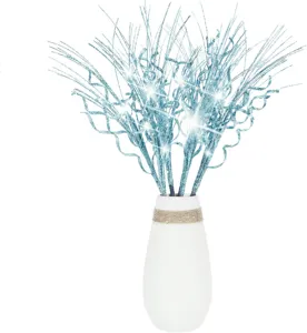 Macro detail of blue glitter Christmas decorative branches with shimmering sequin finish