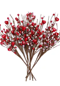 Close-up view of artificial red heart berry branches for Valentine's Day floral decorations