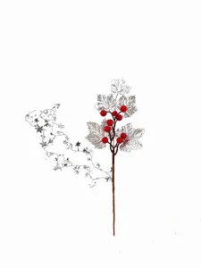 Detailed shot of silver maple leaf and red berries on a 36cm Christmas decorative pick