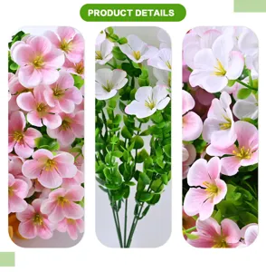 Detailed close-up view of artificial pink wildflower and eucalyptus branch decoration