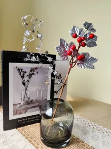 Decorative 36cm Christmas branch with silver maple leaves and vibrant red berries