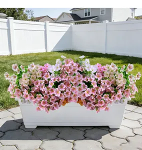 Artificial flowers in white planter pot outdoor garden home decoration fake floral arrangement