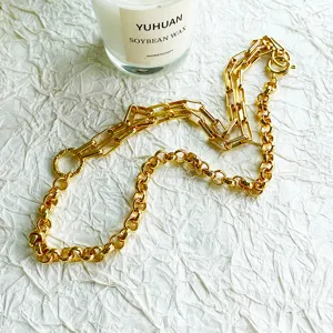 Detailed macro view of this vintage gold mixed-link chain necklace in Roman style