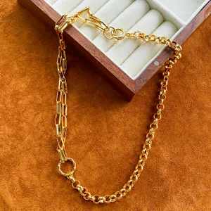 Vintage gold-toned necklace featuring unique asymmetrical mixed-link chain design